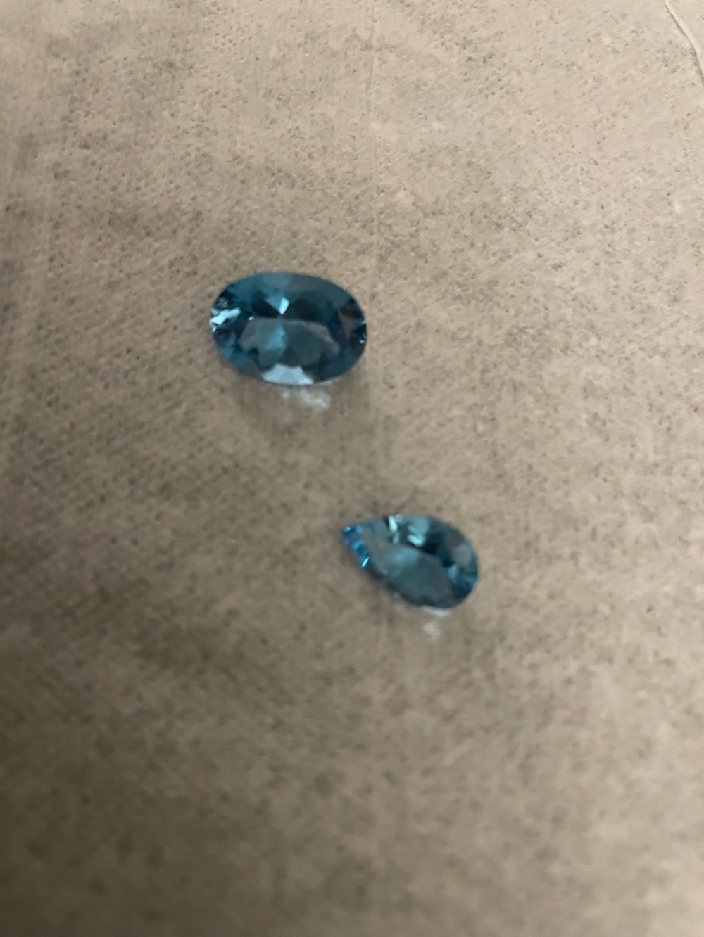 Blue Topaz Gemstones - Oval and Pear Cut - 6.84 carats and 3.19 carats